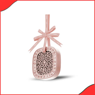 Carori AC vent air freshener fabulous fragrance black clip-on car perfume.