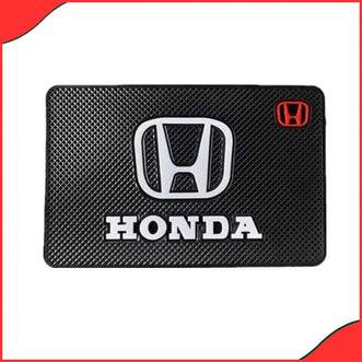 Black silicone anti-slip dashboard mat featuring the Honda logo.