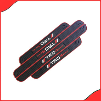 Set of 4 TRD Rubber Door Sill Protectors with sporty logo for front and rear doors.