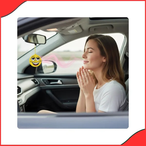 Hanging AREON Smile Car Air Freshener in car interior