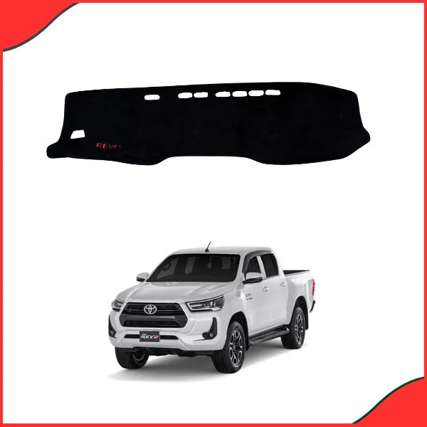 Installed dashboard cover in the Toyota Hilux Revo/Rocco cabin, demonstrating thermal and UV ray protection against harsh sunlight.